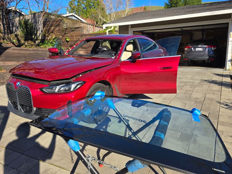 BMW iX windshield on stand ready for installation in Del Mar